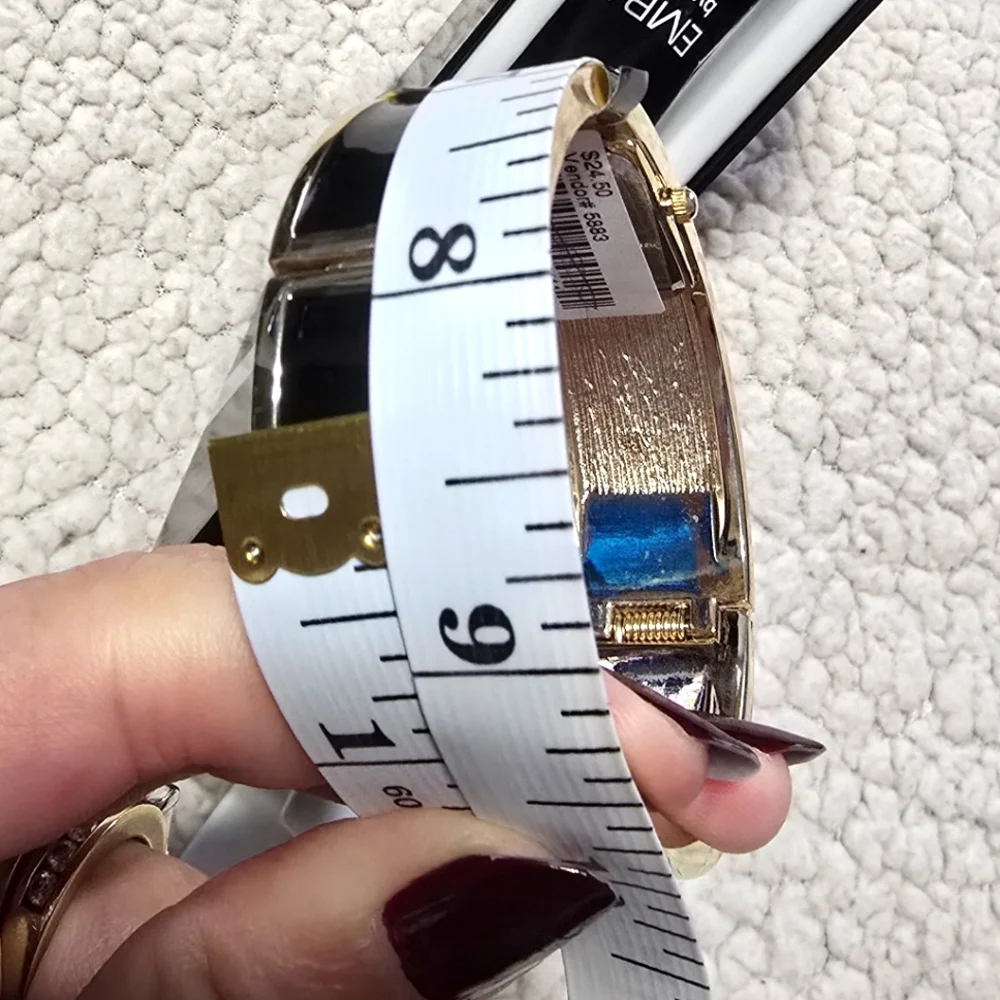 Embassy by Gruen Black and Gold Wearable Watch
